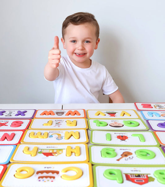 Set of colorful alphabet flashcards with letters and pictures on a red box. Lulliyo