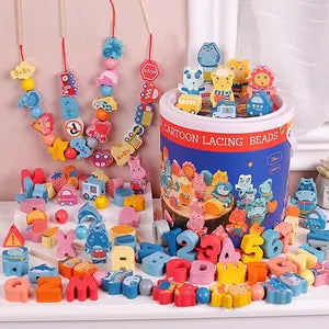 Colorful children's toys including lacing bears and letter blocks on a white surface. Lulliyo